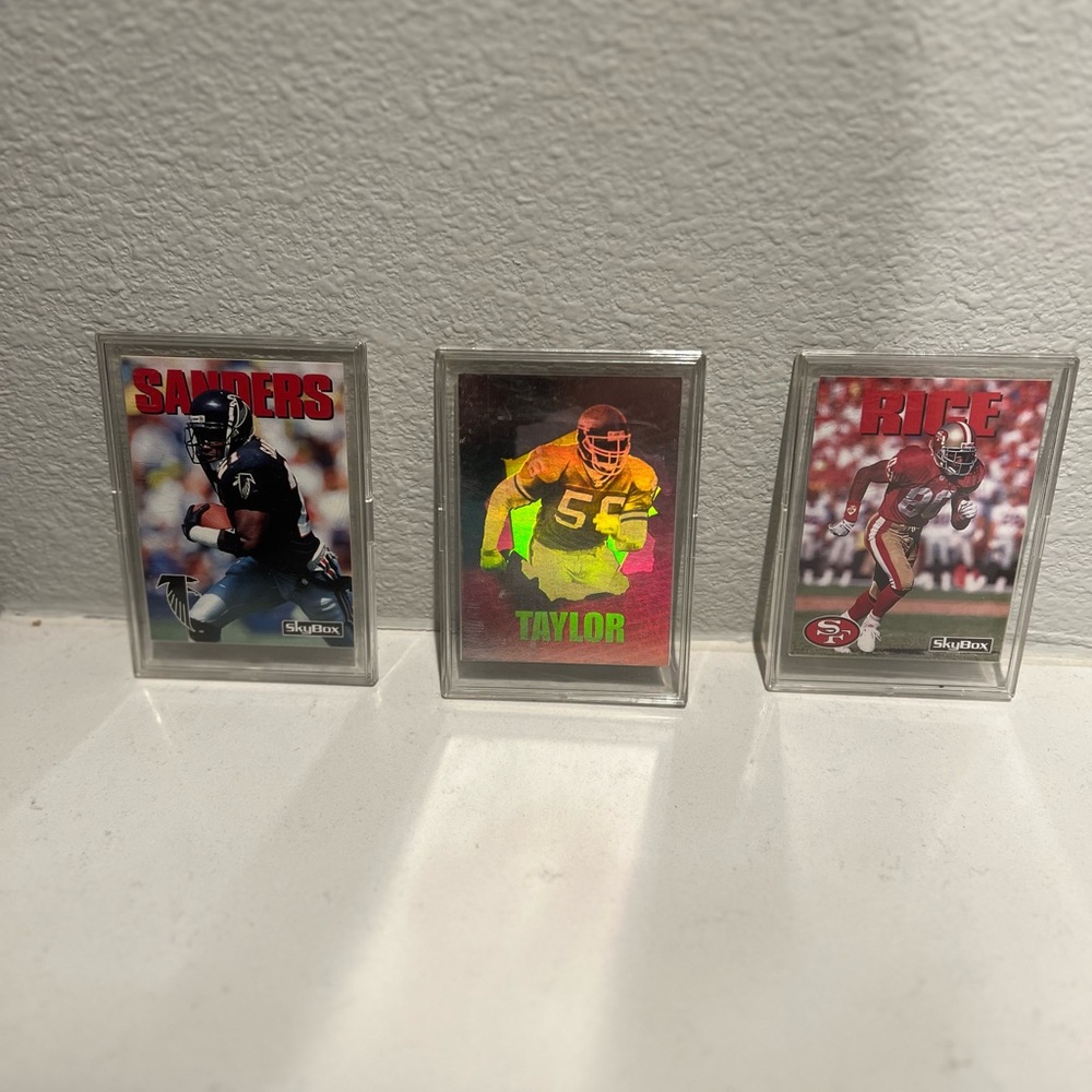 Vintage 1992 Skybox NFL Football Trading Card Trio. Never taken out of casing.